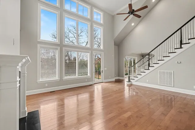 a view of an entryway with wooden floor