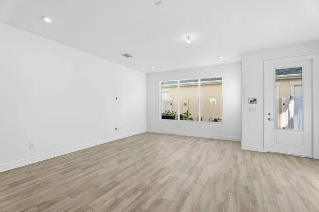 an empty room with window