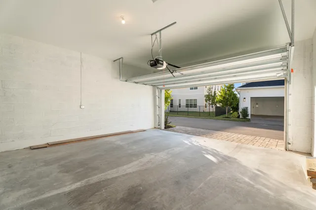 a view of a room with lots of gym equipment