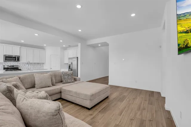 a living room with furniture and a couch
