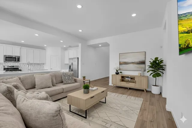 a living room with furniture and a couch