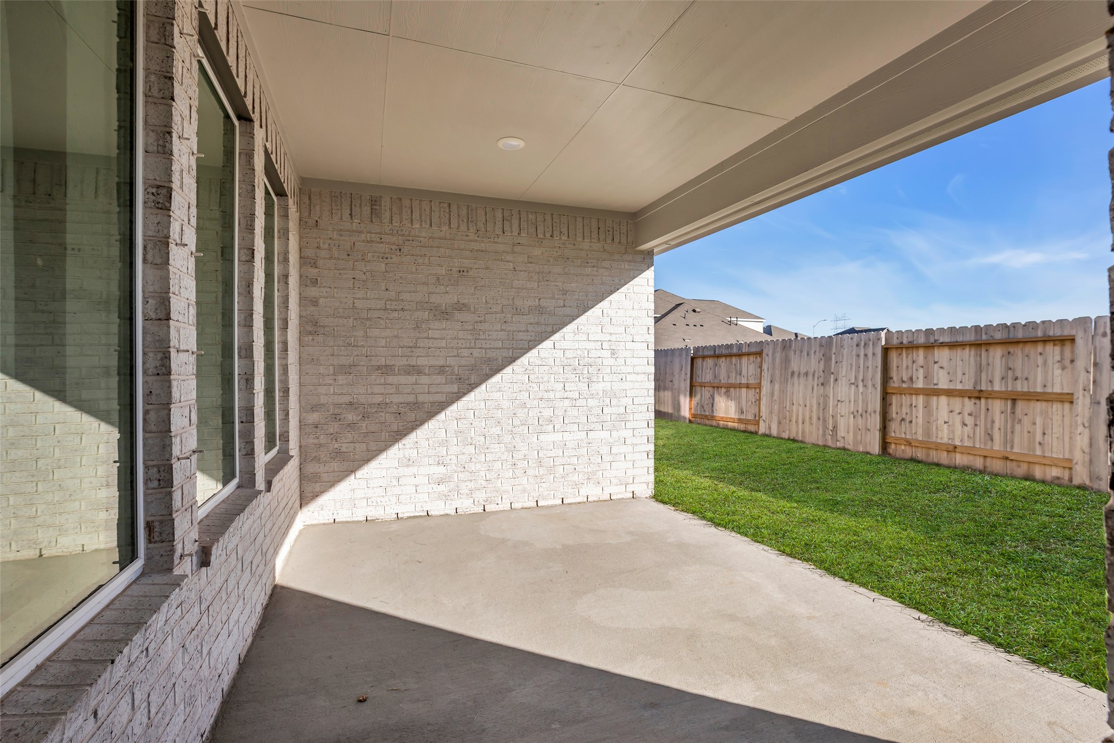 8619 Jade Hl Drive Rosharon, TX 77583 - Photo 47 of 50 Private covered patio designed for relaxed outdoor living without the commitment of extensive yard maintenance.