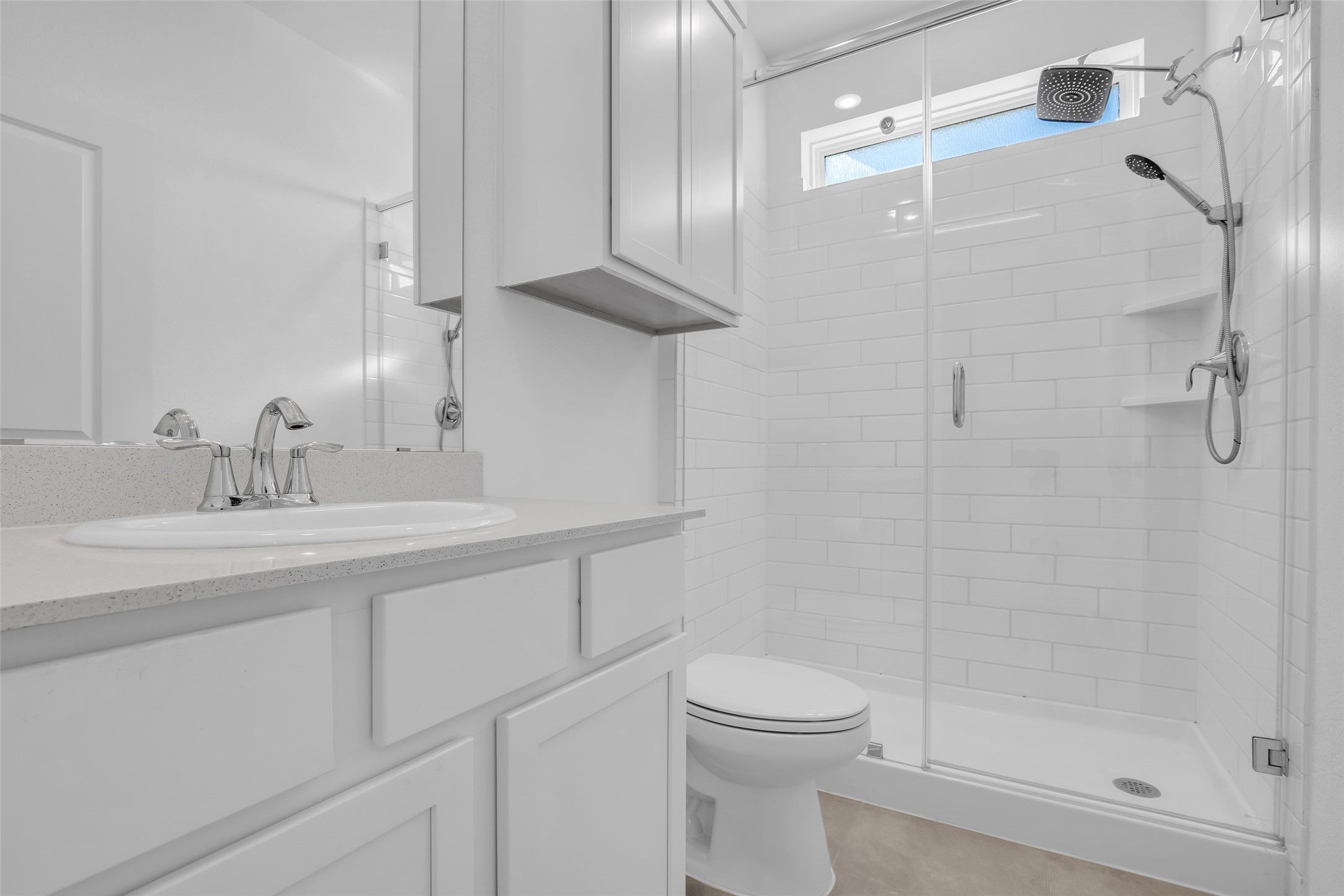 8619 Jade Hl Drive Rosharon, TX 77583 - Photo 10 of 50 Next Gen Ensuite Bathroom: Bright, refined, and thoughtfully finished with a walk-in glass shower, delivering privacy and ease within the self-contained suite.