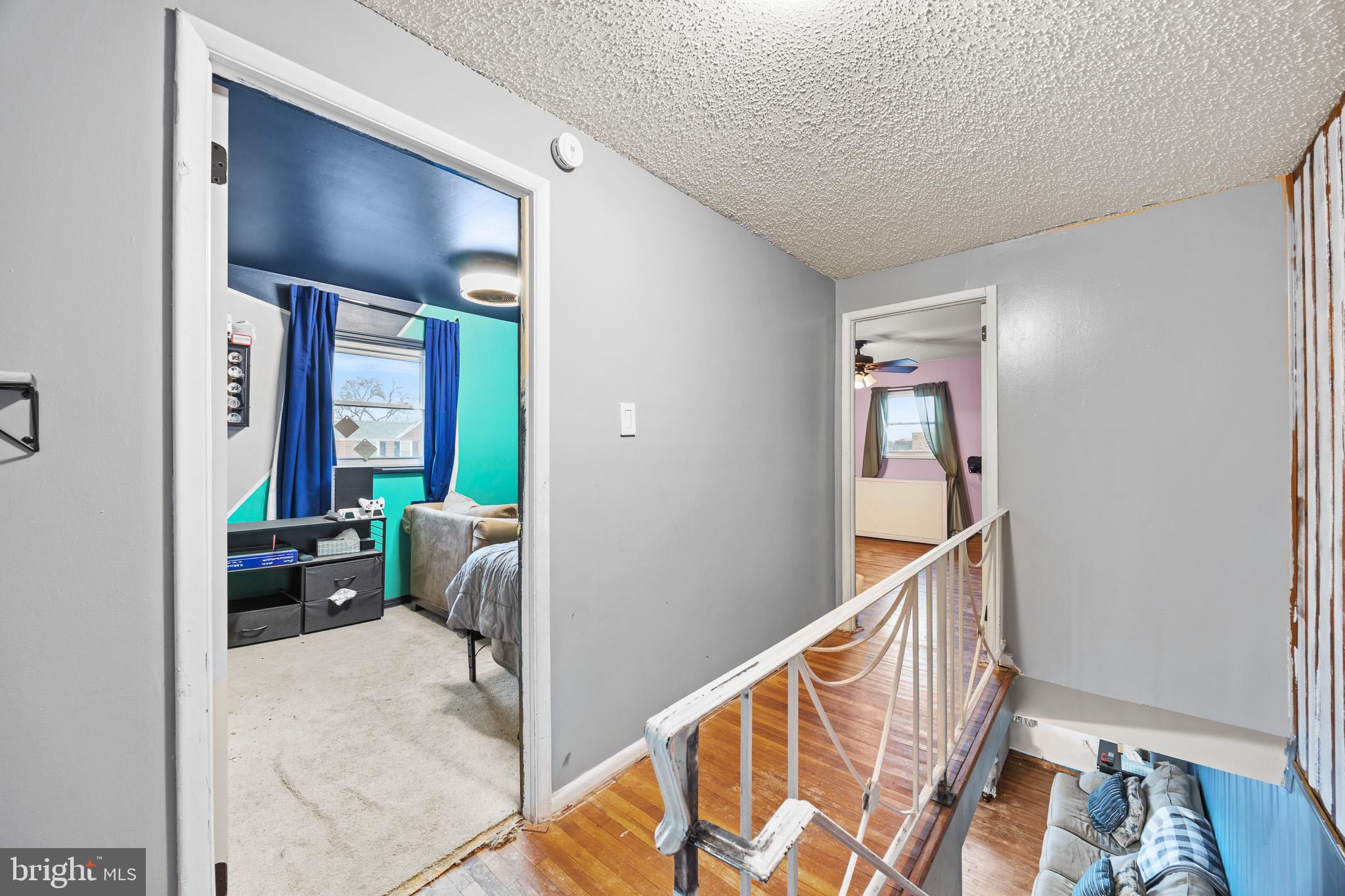 155 Meadow Lane Philadelphia, PA 19154 - Photo 15 of 23 Bright and inviting hallway with vibrant decor.