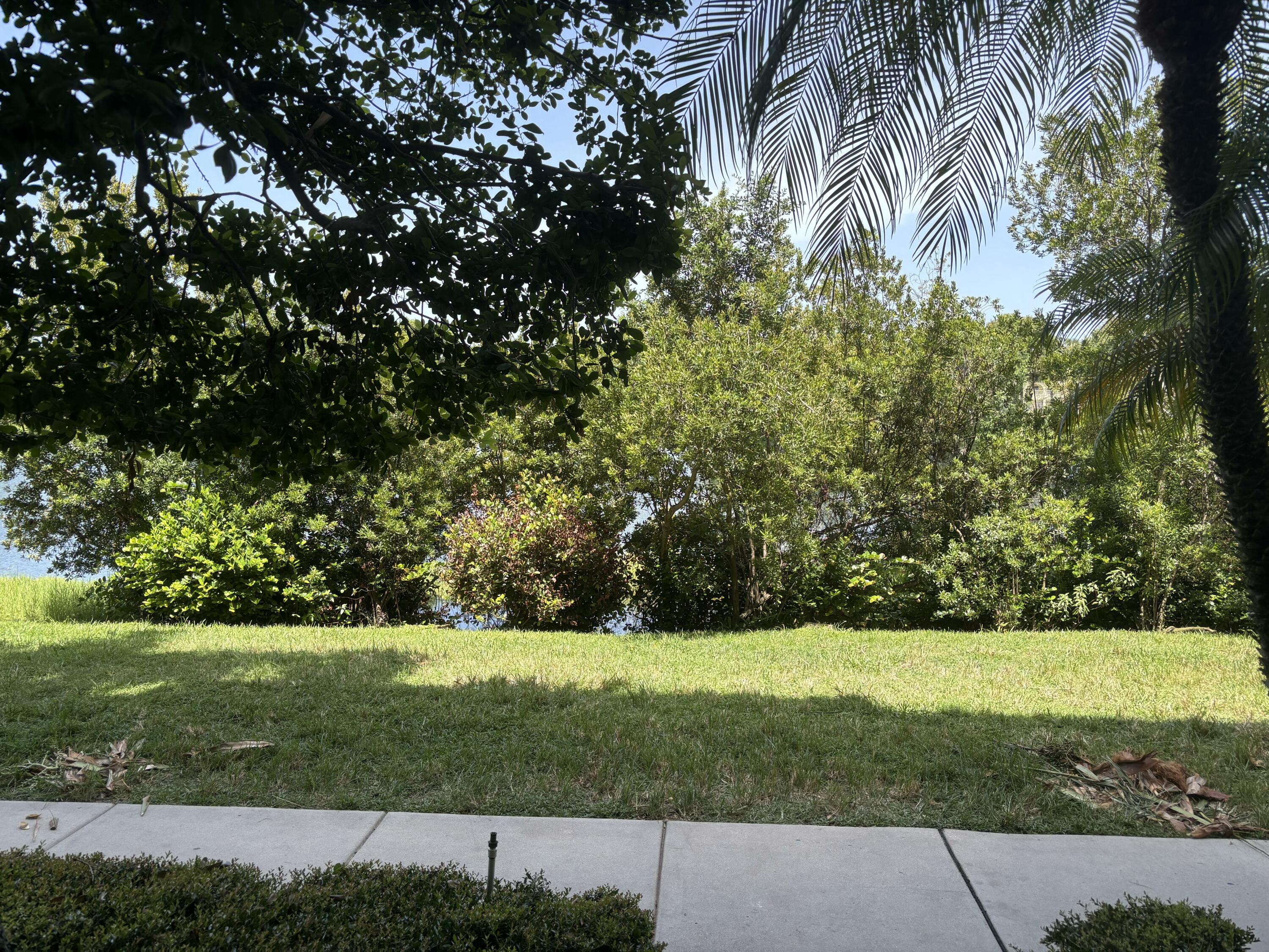 1660 Renaissance Commons Boulevard, Unit 2111 Boynton Beach, FL 33426 - Photo 1 of 2 Patio and walk way