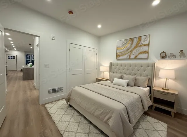 a bedroom with a bed and a walk in closet