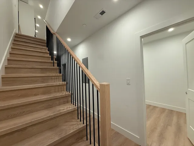 a view of entryway with wooden floor