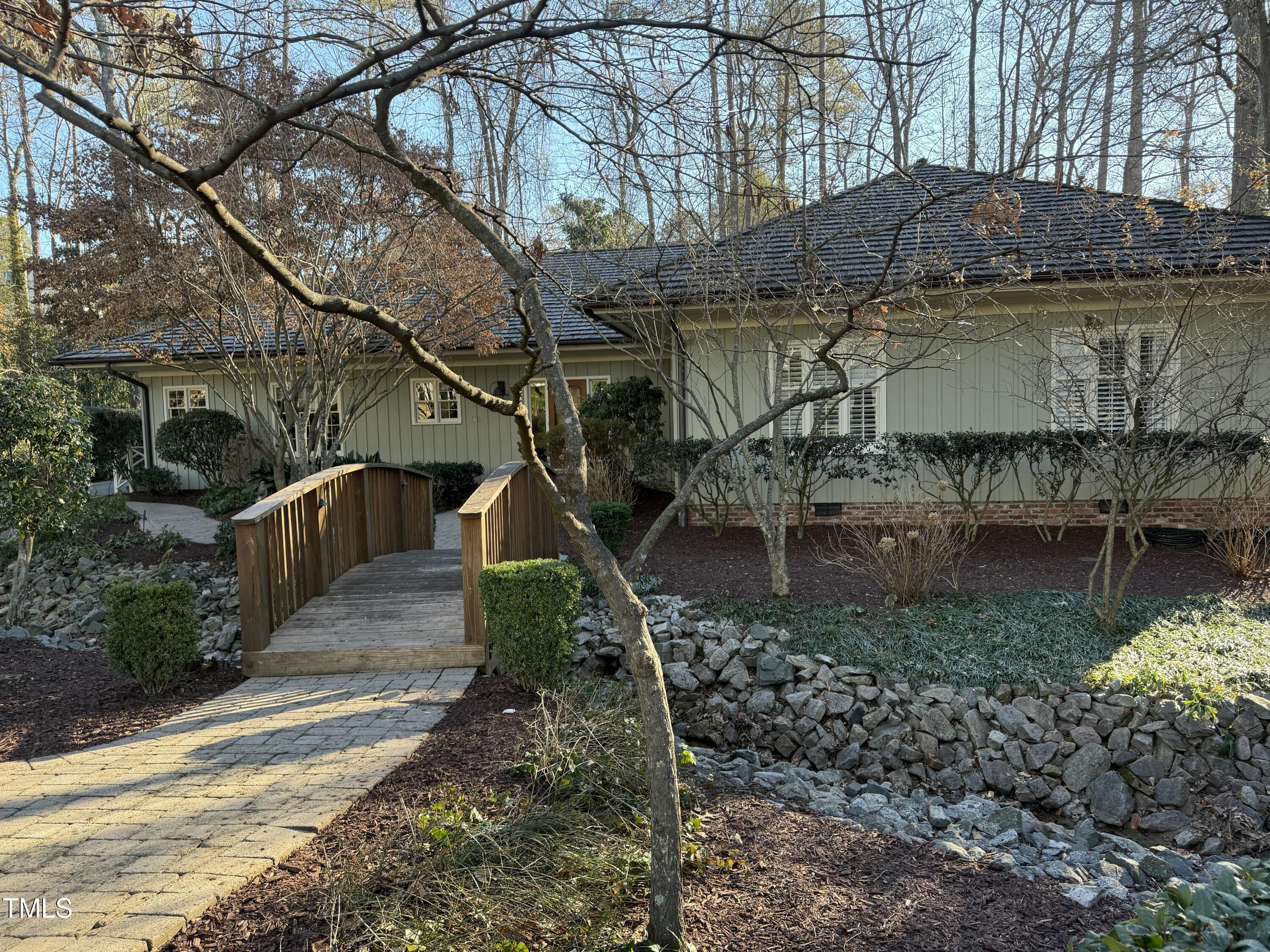 3312 Landor Road Raleigh, NC 27609 - Photo 2 of 3 a view of a house with a yard