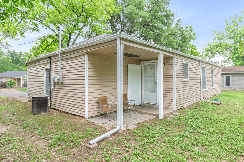 415 Maple Drive Terrell, TX 75160 - Photo 20 of 26 a view of a house with a yard