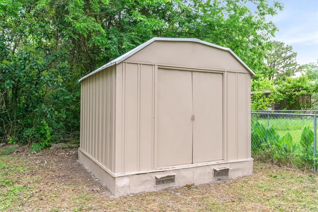 415 Maple Drive Terrell, TX 75160 - Photo 21 of 26 a view of a backyard with plants
