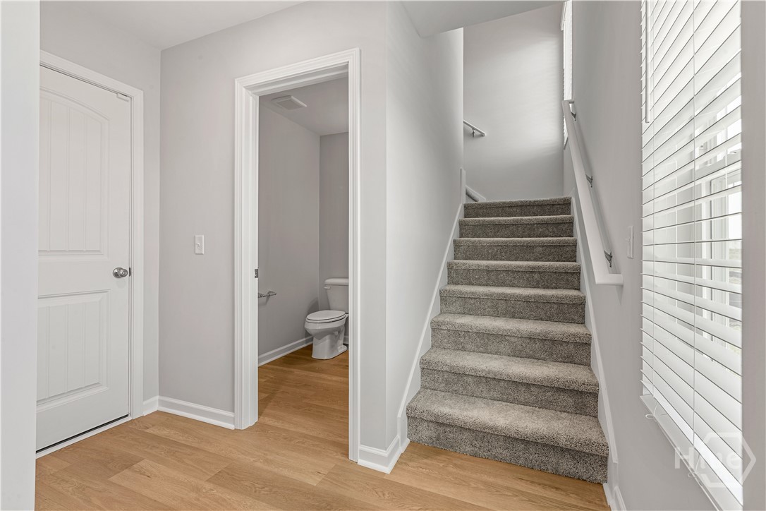 104 Hasty Point Road Port Wentworth, GA 31407 - Photo 12 of 40 Powder Bath and Stairs