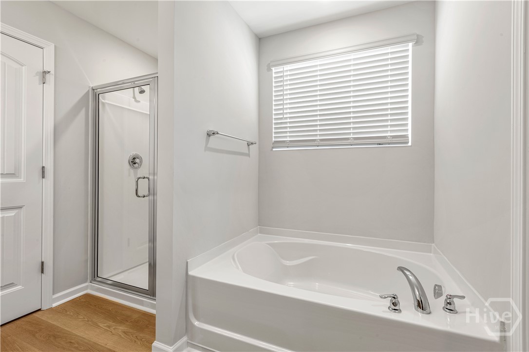 104 Hasty Point Road Port Wentworth, GA 31407 - Photo 17 of 40 Primary Bathroom with Separate Garden Tub and Separate Shower