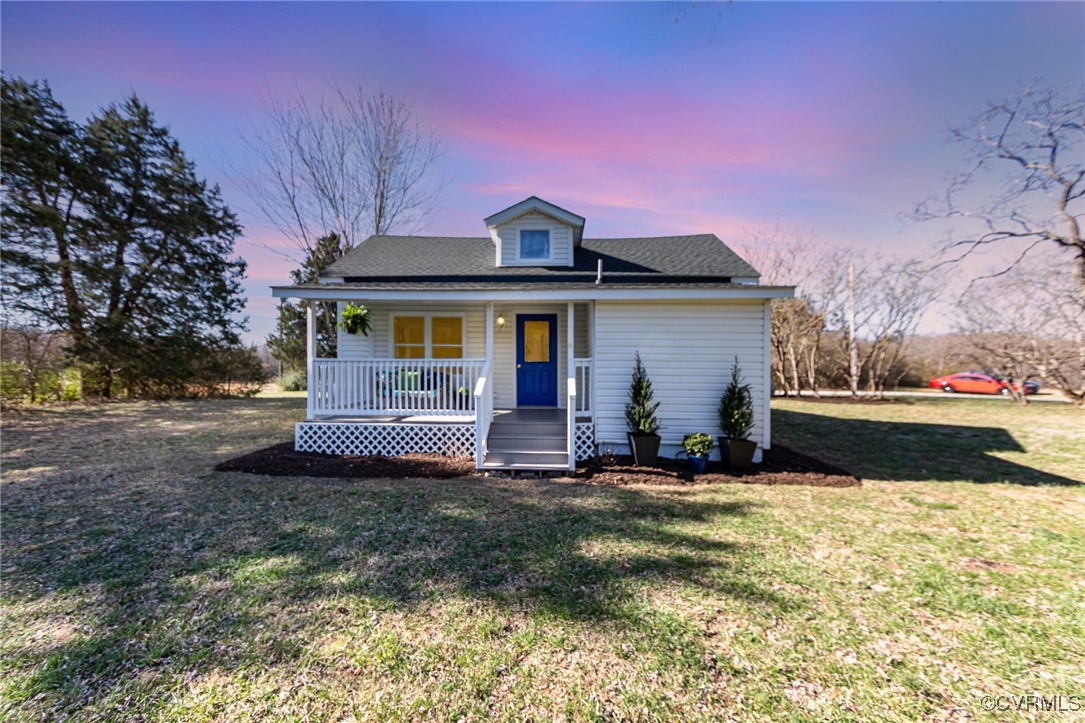 20073 Beaver Dam Road Beaverdam, VA 23015 - Photo 3 of 36 a front view of a house with a yard