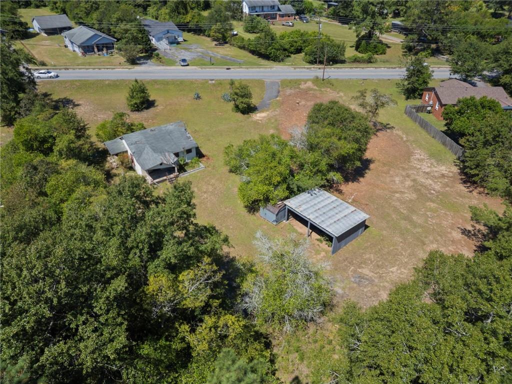 an aerial view of a house with a lake view