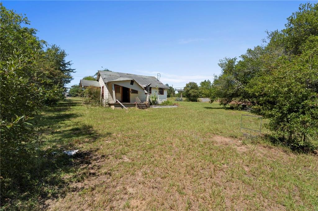 4742 Bloomfield Road Macon, GA 31206 - Photo 17 of 18 a front view of a house with a yard