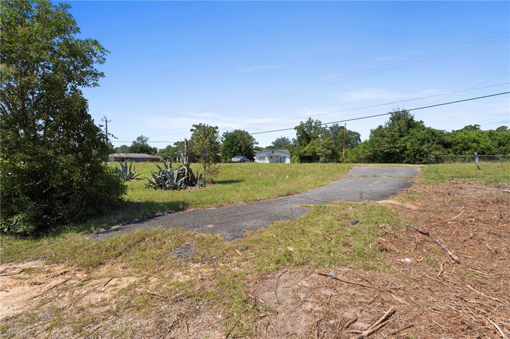 4742 Bloomfield Road Macon, GA 31206 - Photo 18 of 18 a view of road with grass space