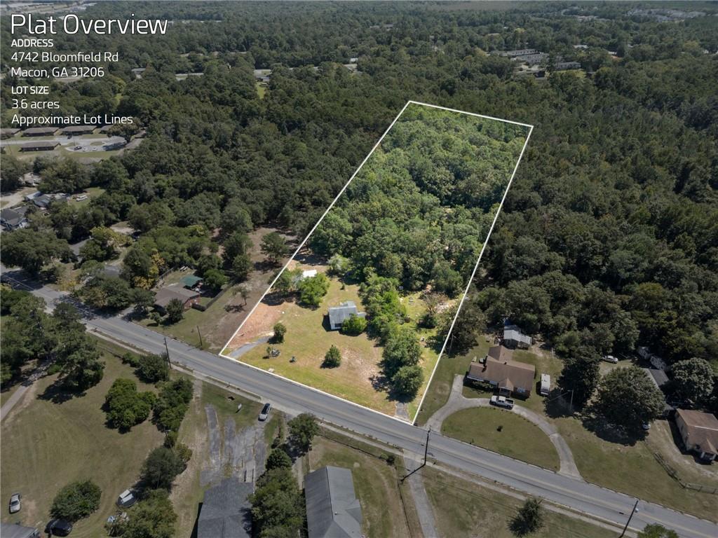 4742 Bloomfield Road Macon, GA 31206 - Photo 2 of 18 an aerial view of a residential houses with outdoor space