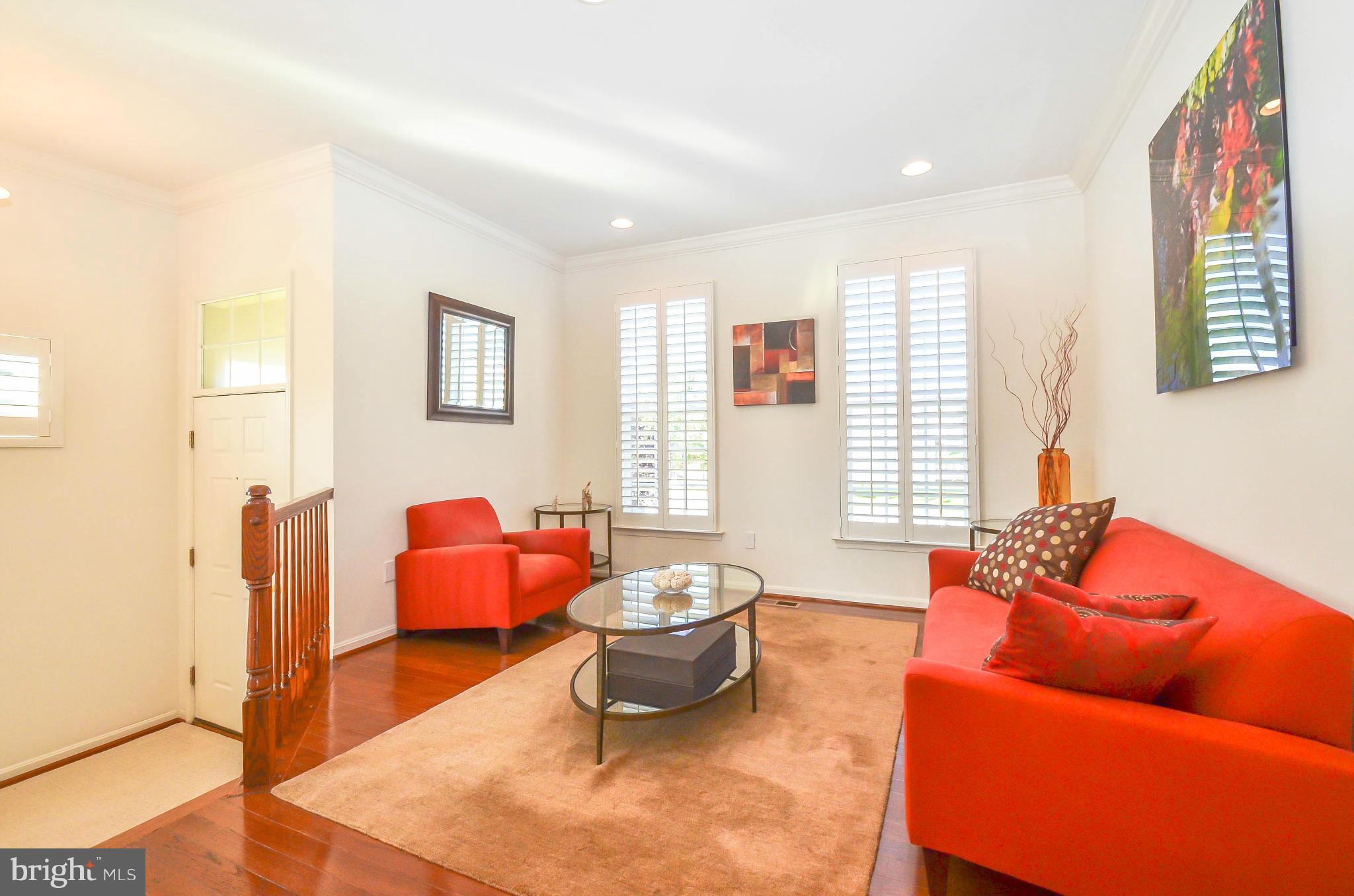 6620 Pebble Brooke Road Baltimore, MD 21209 - Photo 2 of 30 a living room with furniture and a window