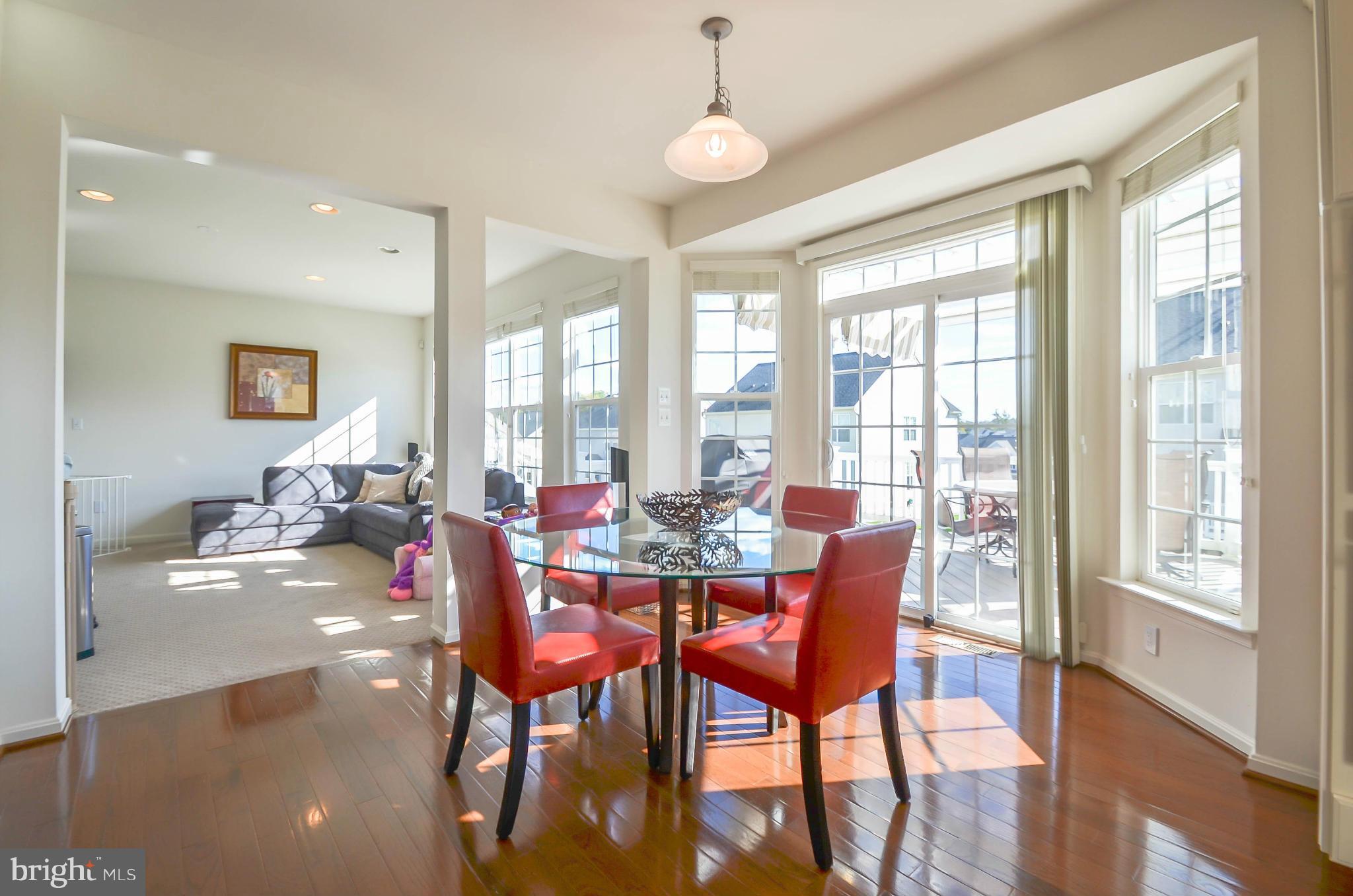 6620 Pebble Brooke Road Baltimore, MD 21209 - Photo 7 of 30 a view of a dining room with furniture window and outside view