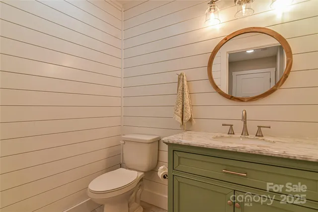 a bathroom with a toilet and a sink