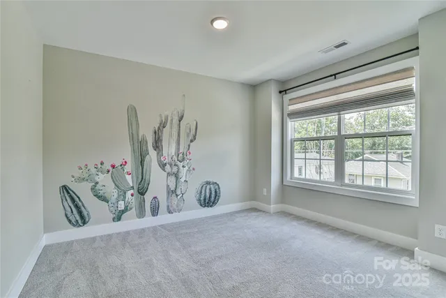 a view of a livingroom with a potted plant