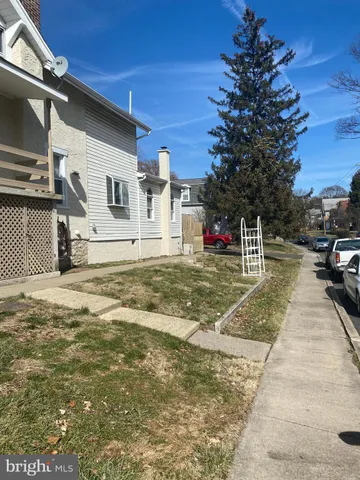 a view of a street with houses