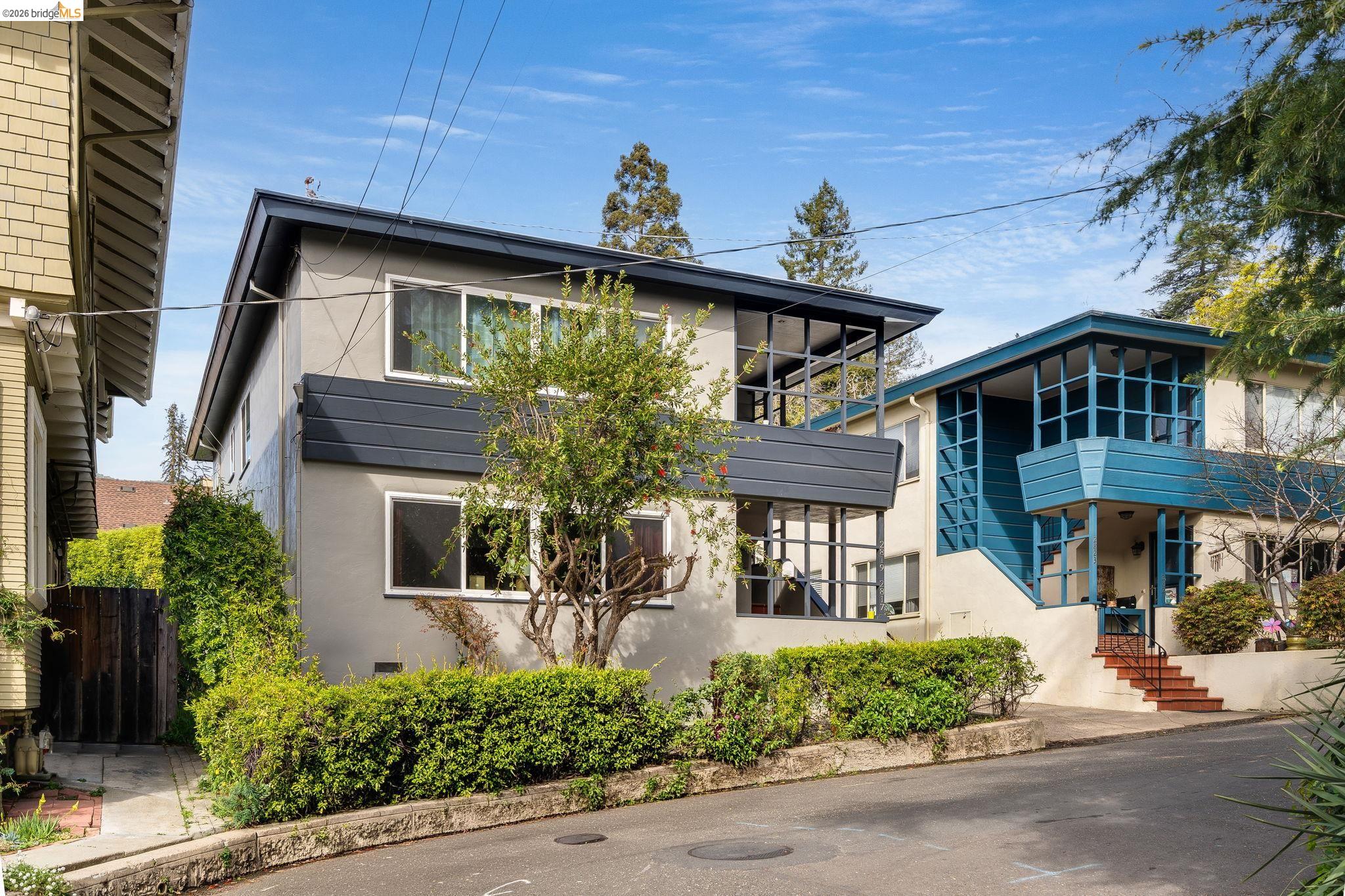 2817 Palm Court Berkeley, CA 94705 - Photo 1 of 22 a front view of a house with a yard