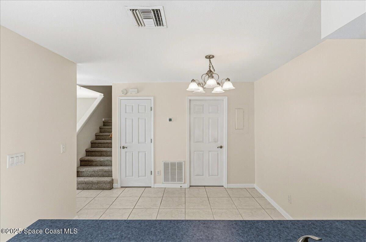 4129 Bond Avenue Rockledge, FL 32955 - Photo 15 of 45 a view of a livingroom with stairs
