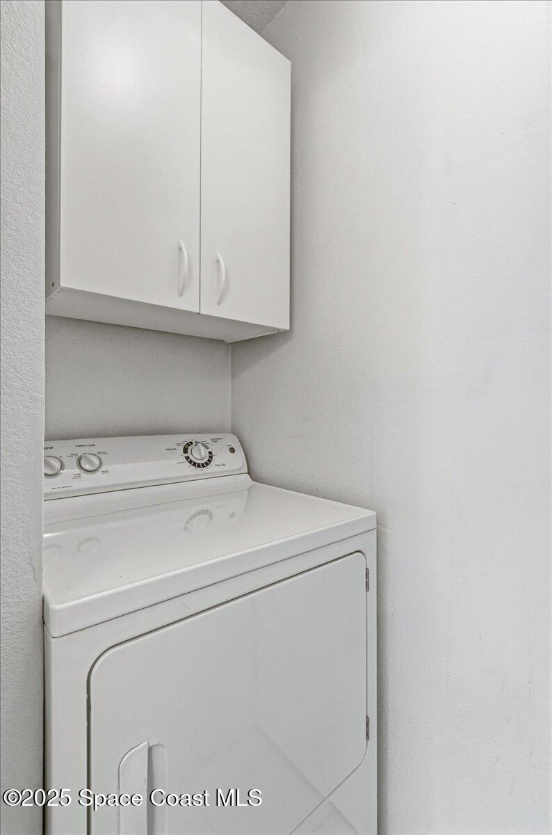 4129 Bond Avenue Rockledge, FL 32955 - Photo 20 of 45 a utility room with dryer and washer