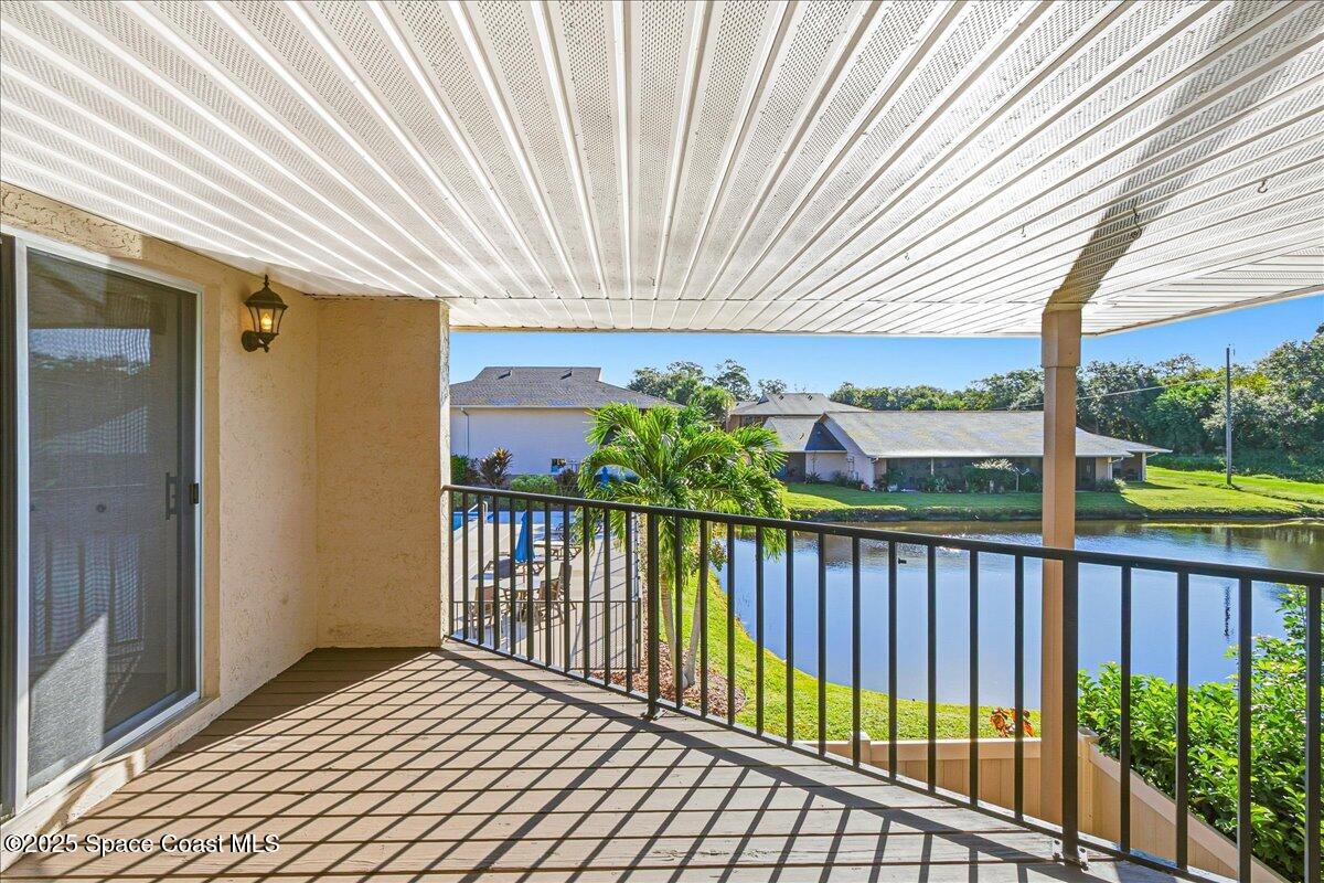 4129 Bond Avenue Rockledge, FL 32955 - Photo 27 of 45 a view of a balcony with wooden floor