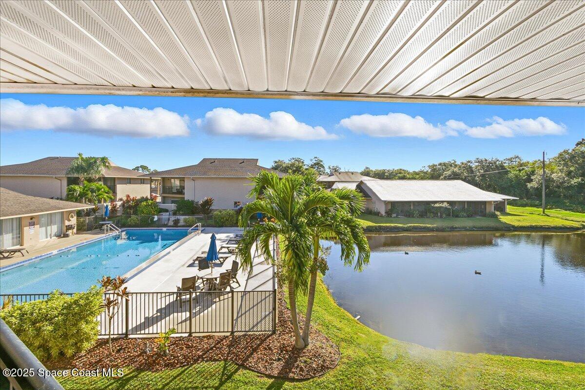 4129 Bond Avenue Rockledge, FL 32955 - Photo 29 of 45 a view of swimming pool with outdoor seating