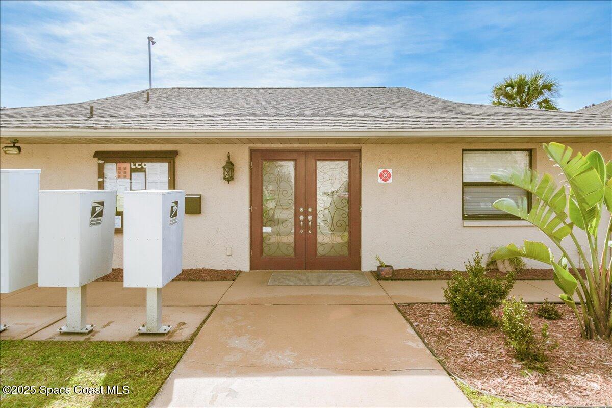 4129 Bond Avenue Rockledge, FL 32955 - Photo 32 of 45 a front view of a house with a porch