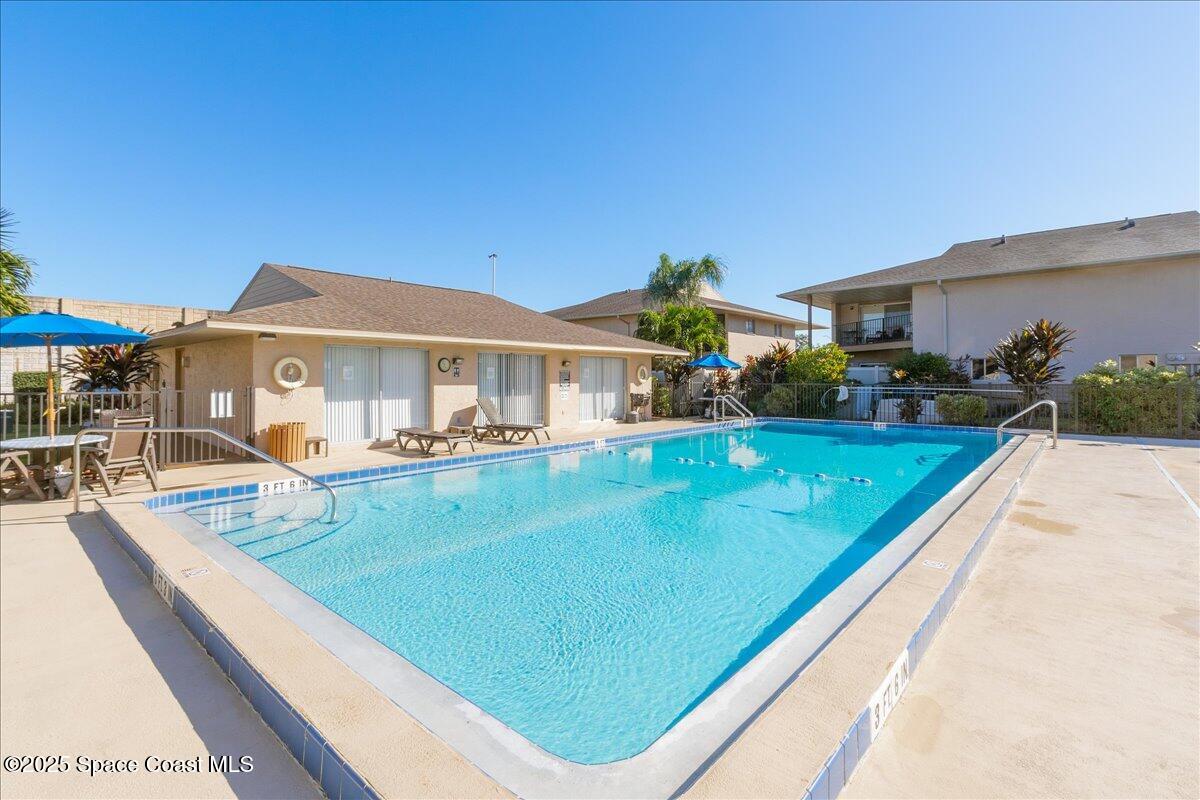 4129 Bond Avenue Rockledge, FL 32955 - Photo 40 of 45 a view of a house with swimming pool