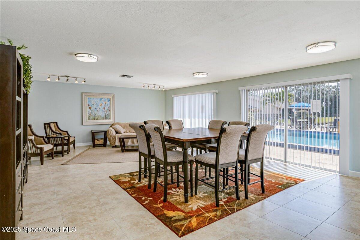 4129 Bond Avenue Rockledge, FL 32955 - Photo 41 of 45 a view of a dining room with furniture
