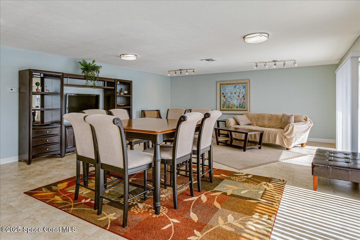 4129 Bond Avenue Rockledge, FL 32955 - Photo 42 of 45 a view of a dining room with furniture