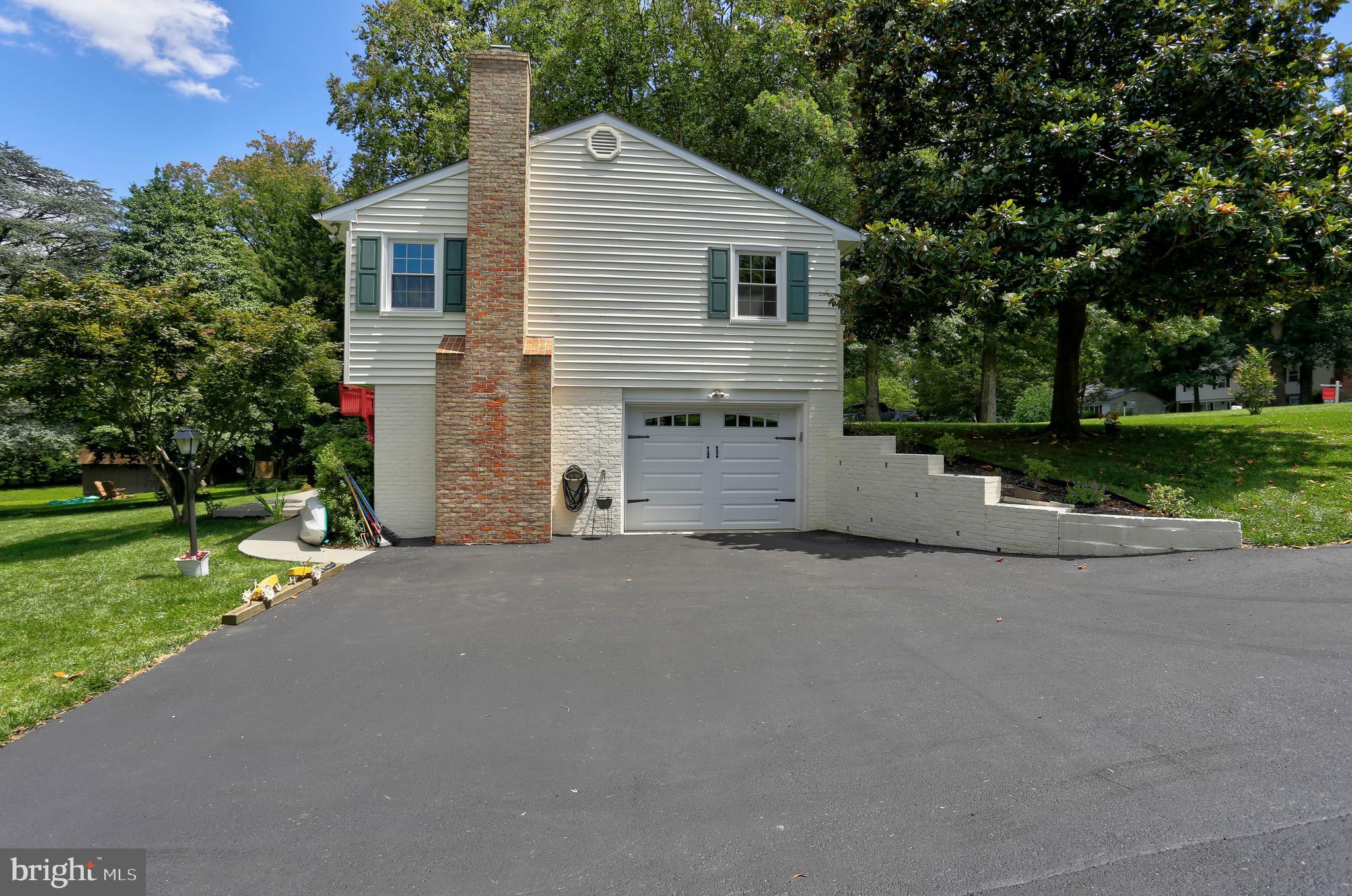 4613 Roundhill Road Ellicott City, MD 21043 - Photo 3 of 39 Exterior Side/Driveway/Garage