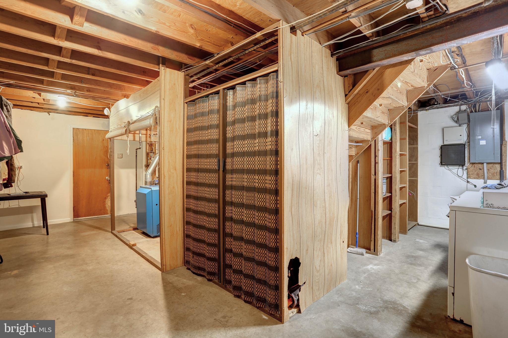 4613 Roundhill Road Ellicott City, MD 21043 - Photo 24 of 39 Basement Storage/Laundry