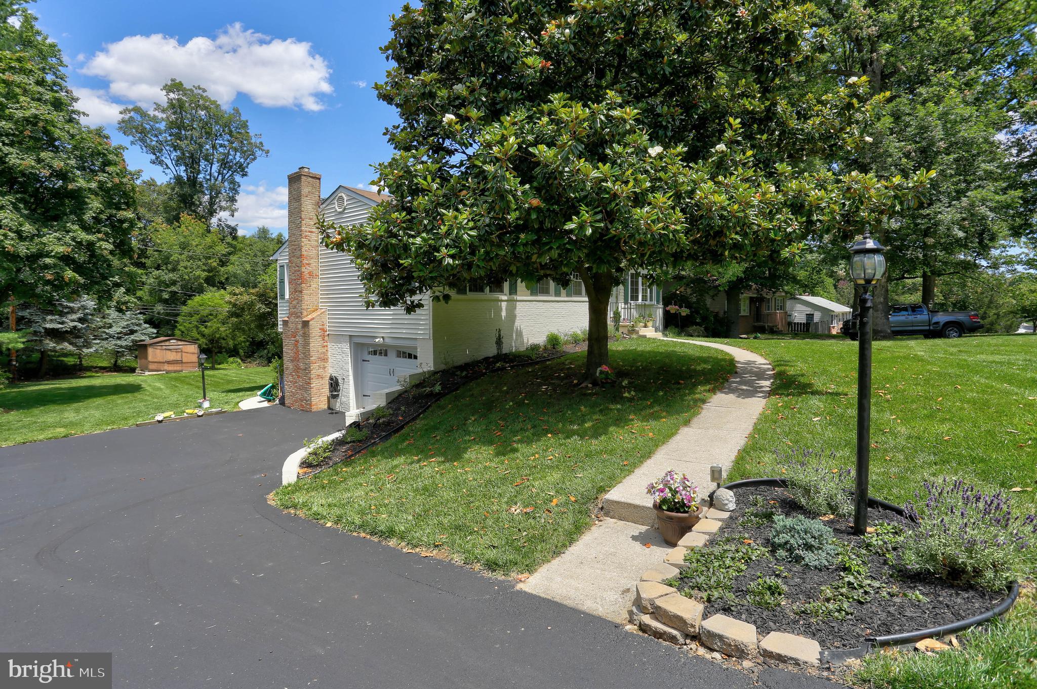 4613 Roundhill Road Ellicott City, MD 21043 - Photo 36 of 39 Exterior Side/Driveway/Garage