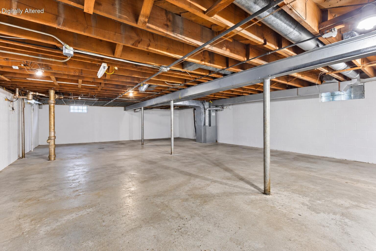 2063 Mt Pleasant Street Racine, WI 53404 - Photo 16 of 24 Spacious Unfinished Basement Interior