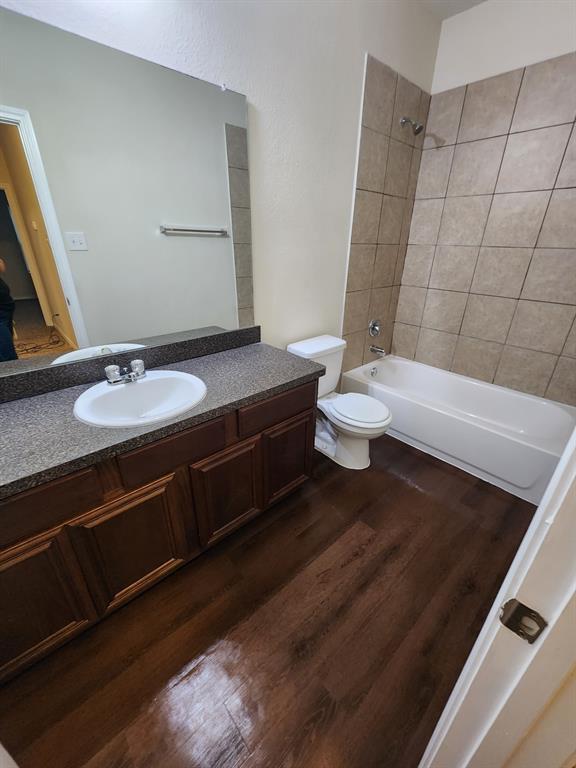 5516 Del Rey Drive Denton, TX 76208 - Photo 12 of 16 a bathroom with a sink and a mirror