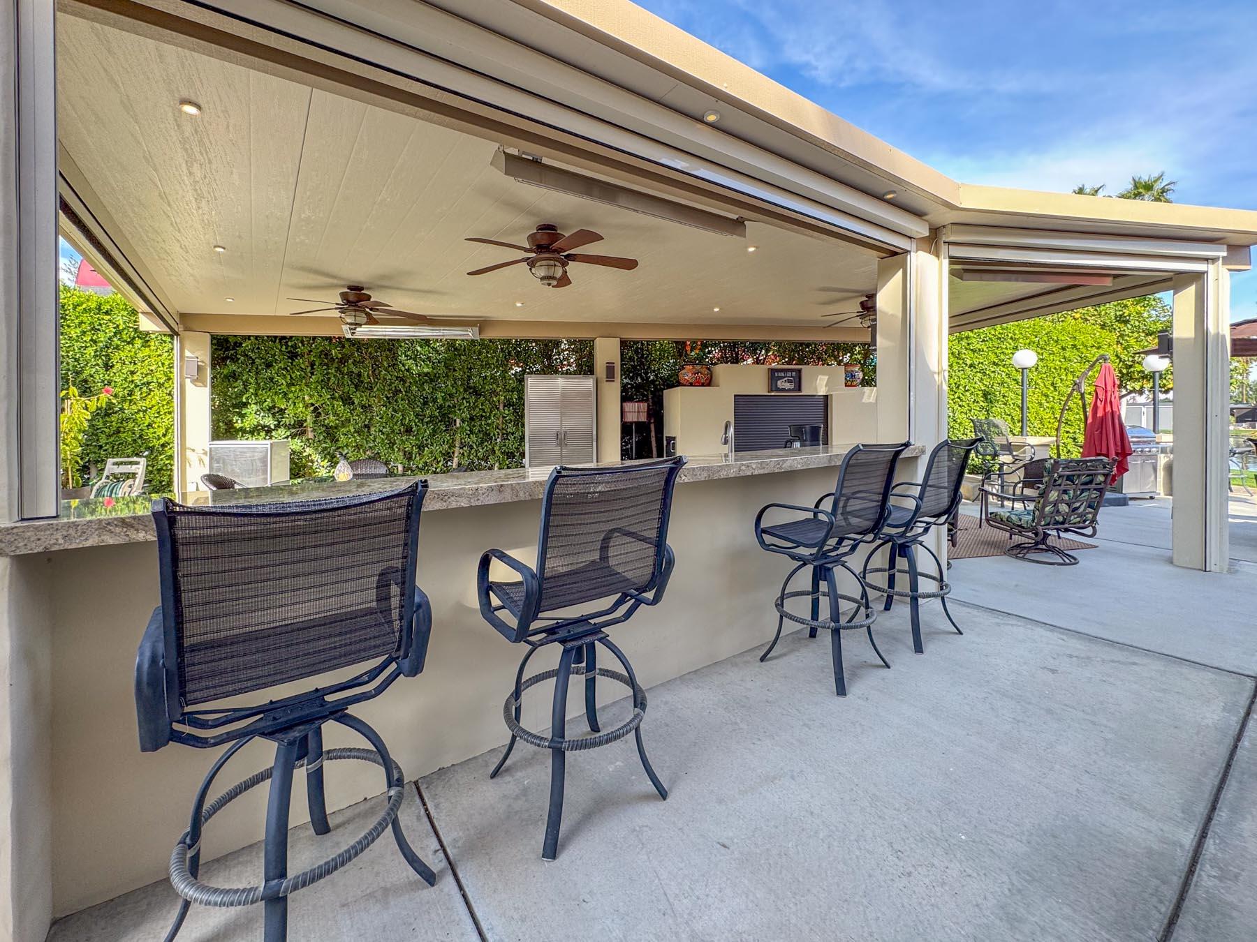80394 Ave 48, Unit 421 Indio, CA 92201 - Photo 5 of 33 a view of a dining room with furniture window and outside view