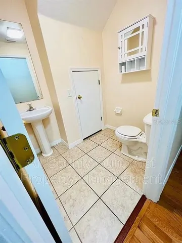 a bathroom with a sink and a toilet