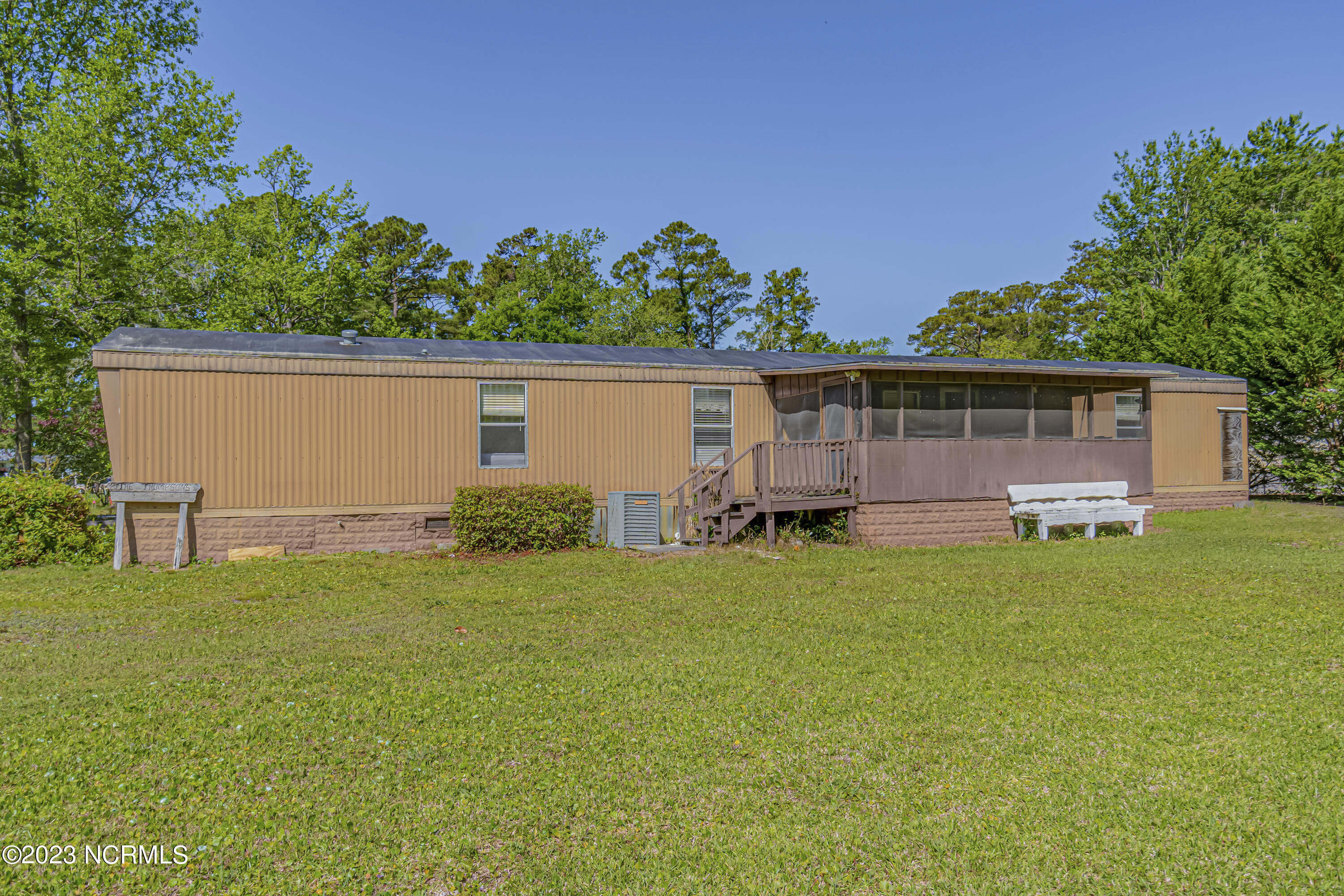 7253 Brigadier Avenue Southwest Ocean Isle Beach, NC 28469 - Photo 1 of 32 Side View