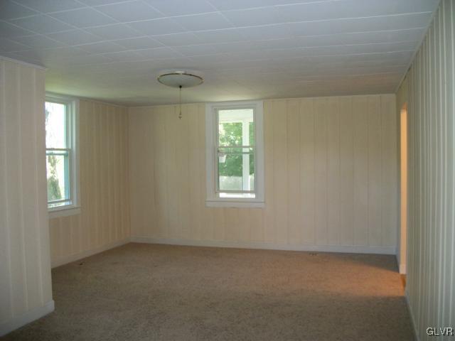 838 Pheasant Run Road Effort, PA 18330 - Photo 7 of 23 an empty room with windows