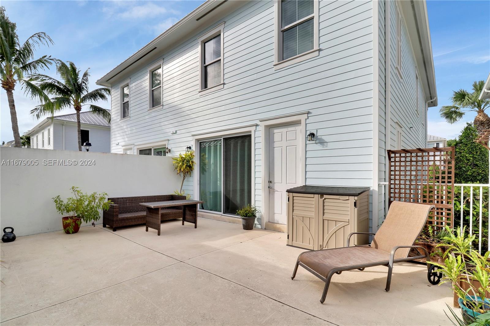 1184 Islamorada Drive, Unit 1184 Jupiter, FL 33458 - Photo 26 of 34 a view of a house with sitting area and furniture