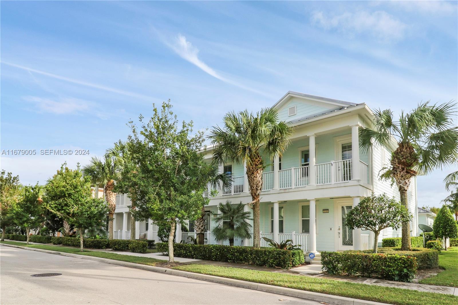 1184 Islamorada Drive, Unit 1184 Jupiter, FL 33458 - Photo 34 of 34 a front view of a house with a yard