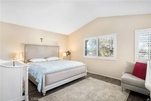 a bedroom with furniture and a couch