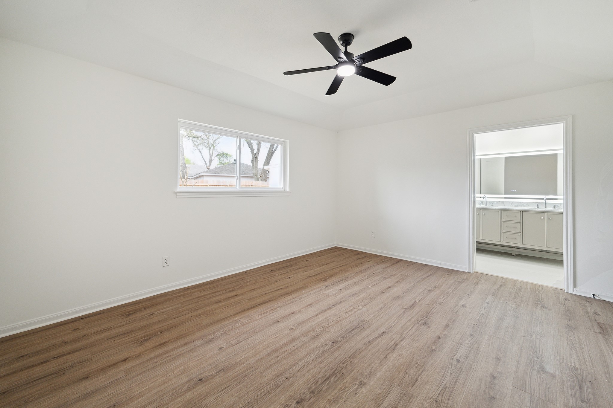 9719 Springmont Drive Houston, TX 77080 - Photo 21 of 32 Behind elegant double doors, master bedroom leads to the spa-like master bathroom!! Or can be kept open for a more modern vibe!
