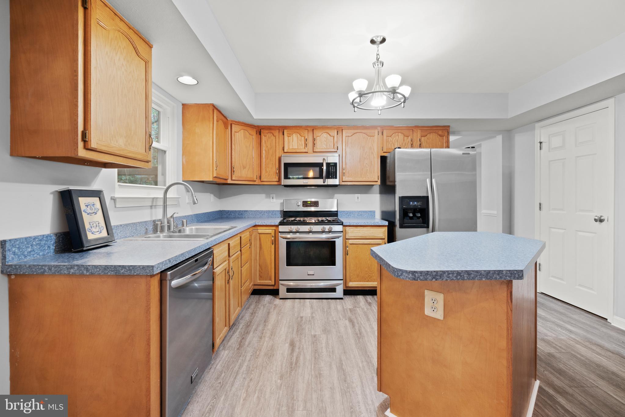 616 Shipley Road Linthicum Heights, MD 21090 - Photo 8 of 40 Brand new floors in the open concept kitchen.