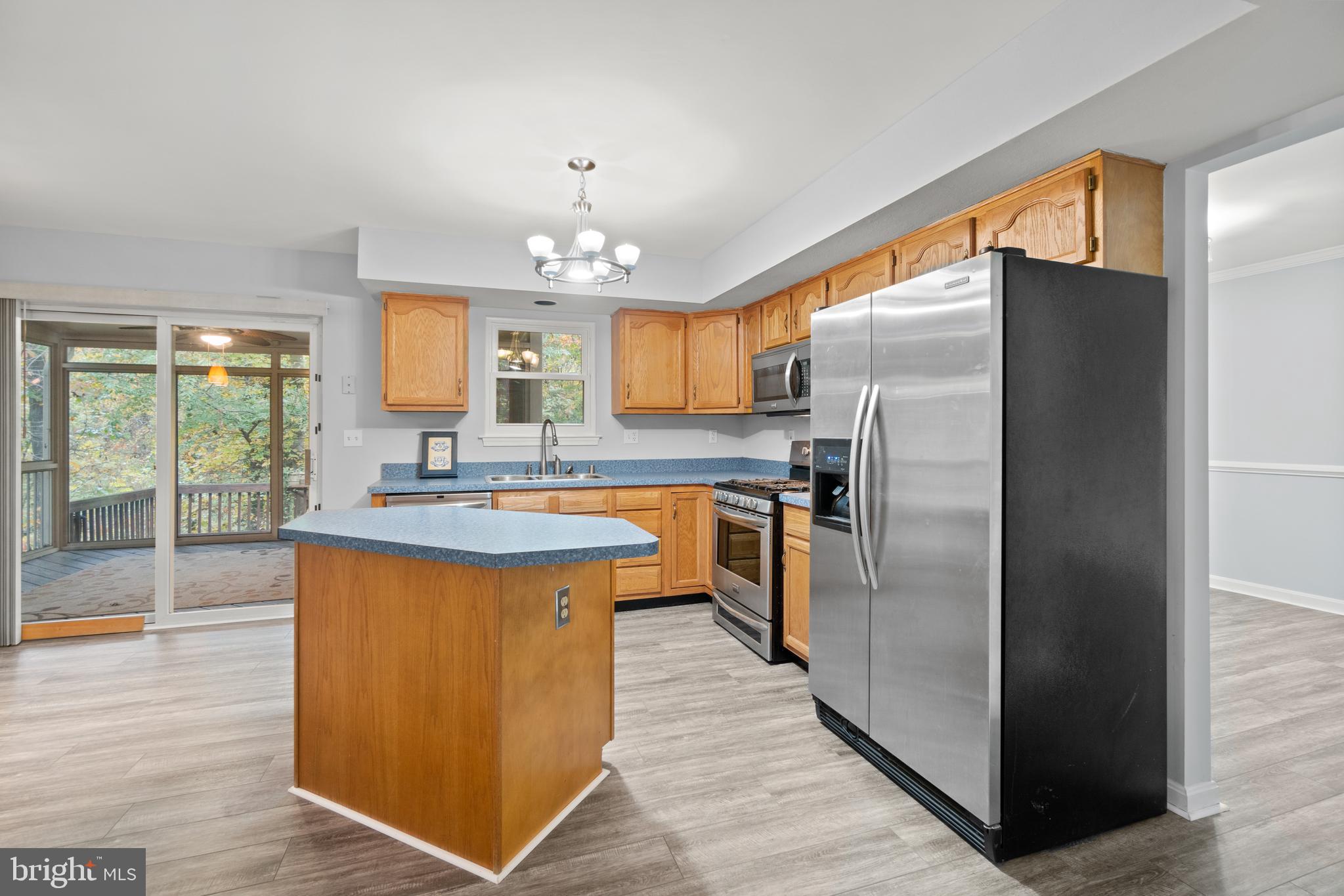 616 Shipley Road Linthicum Heights, MD 21090 - Photo 9 of 40 Stainless steel appliances throughout kitchen.